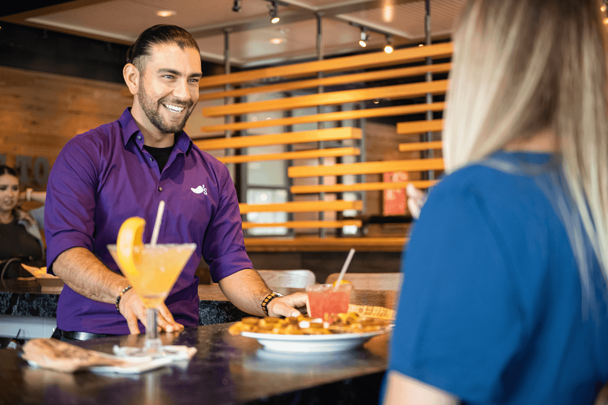 https://d3n2401vhvcfv5.cloudfront.net/_images/company/chilis/interior-1.png