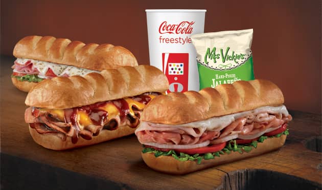 https://d3n2401vhvcfv5.cloudfront.net/_images/company/Firehouse subs/1737400513935-table-shot-combo.jpg