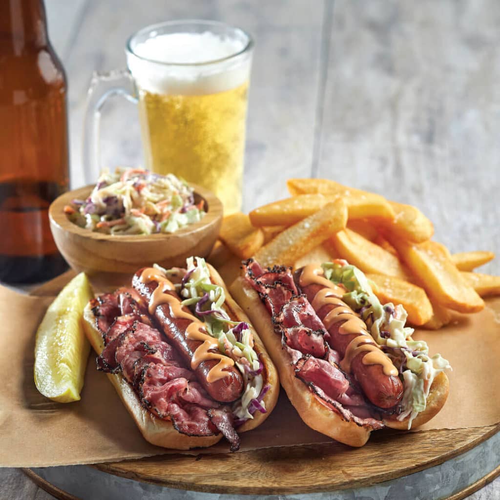 https://d3n2401vhvcfv5.cloudfront.net/_images/company/TooJay’s/1738007419809-Deli-Dogs-Hotdogs-Dania-Beach-FL-1024x1024.jpg